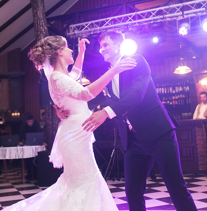 beautiful bride and groom dancing the first dance